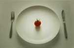 small tomato on plate